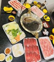 Set foods of meat and vegetables with Chinese soup photo