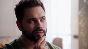 Pensive thoughtful Caucasian business man male guy homeowner model client businessman customer think touching chin gesture pondering choosing decide nodding head idea decision at home inside apartment video