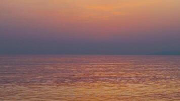 Night Ocean Scenery. Red Light Reflecting on Ocean. video
