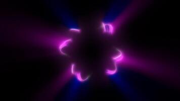 Vibrant pink and cyan neon swirl forming a glowing X-shape on a dark abstract background, evoking digital speed and energy video