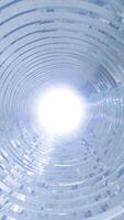 White glowing tunnel with concentric circular patterns creating a futuristic and immersive visual effect video