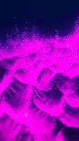 abstrato ondas do Rosa brilhando partículas formando fluido movimento em uma Sombrio fundo video