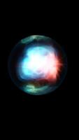 Abstract glowing sphere with swirling light patterns in blue and red hues against a black background video