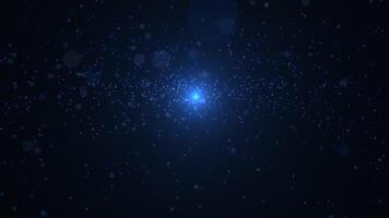 Radiant blue light burst with sparkling particles and glowing rays on dark background. Perfect for sci-fi, space, energy, or futuristic digital effects and backgrounds. video