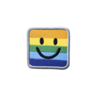 Colorful embroidered patch features smiling face on rainbow striped background, symbolizing positivity and inclusivity. square design is outlined in light blue stitching png