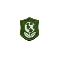 Green embroidered patch features globe and plant, symbolizing environmental awareness and sustainability. design is simple yet impactful, promoting eco friendly values png