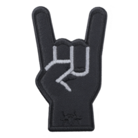 Black embroidered patch features hand making rock and roll gesture, with white stitching outlining fingers. patch has textured appearance, adding bold and edgy vibe png