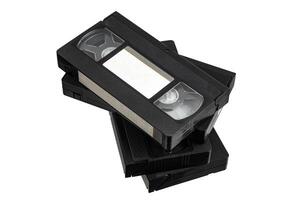 A collection of black VHS cassettes organized into a stack, highlighting their iconic retro design. photo