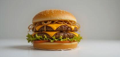 Juicy Beef Burger with Cheddar, Tomato, and Fresh Toppings Isolated on Clean White Surface photo