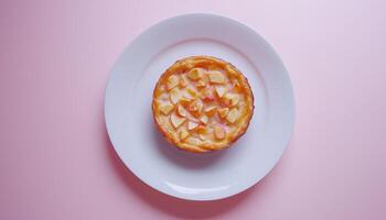 Apple fruity cake baked on white plate isolated pink table background photo