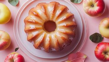 Sweet apple pound cake on plate for snack family time on plate and pink background photo