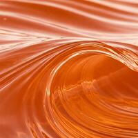 Abstract orange colored liquid wave background photo