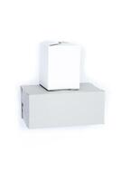 A white box sitting on top of a white box photo