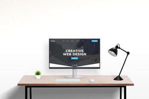 Web design studio portfolio page concept displayed on modern computer in office work desk setting. Showcase of creative digital projects and professional design work photo