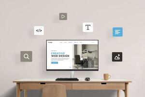 Work desk with computer display featuring web design studio presentation page, surrounded by flying web design icons. Visual representation of a creative digital workspace concept photo