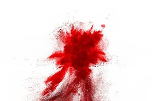 Capture of Red Powder Explosion on White Background, Abstract Design of Dust Cloud Particles photo