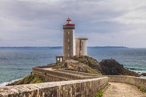 panoramic view of the famous le petit minou lighthouse located in a scenic area of brittany photo