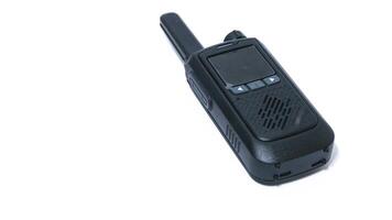 Black portable radio ht or walkie talkie in a white background photo