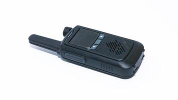 Black portable radio ht or walkie talkie in a white background photo