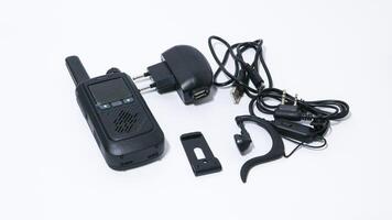 Black portable radio ht or walkie talkie in a white background photo