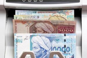 Kazakhstani tenge in the counting machine photo