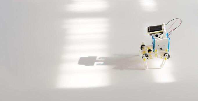 Robots from plastic details, programs on computers, robots, modern training, the hottest equipment, e-learning. photo