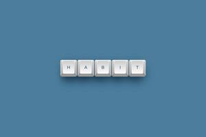 Habit text on a 3d keyboard button with shadow concept series photo