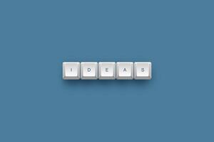 Ideas text on a 3d keyboard button with shadow concept series photo