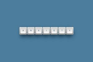 Anxiety text on a 3d keyboard button with shadow concept series photo