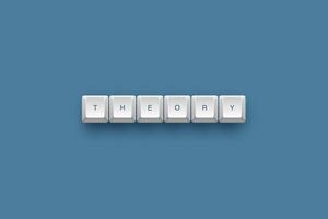Theory text on a 3d keyboard button with shadow concept series photo