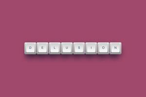 Delusion text on a 3d keyboard button with shadow concept series photo