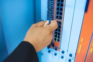 Fix network switch in data center room photo