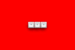 Red text on a 3d keyboard button with shadow concept series photo