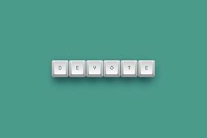 Devote text on a 3d keyboard button with shadow concept series photo