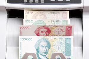 Old Croatian Dinar in the counting machine photo
