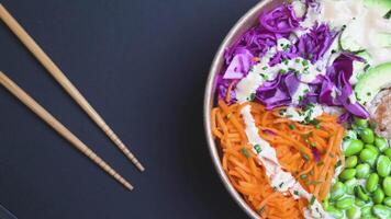 Top Down View of Shrimps Poke Bowl on Black Background video