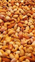 Healthy mixed nuts collection in vibrant marketplace display video