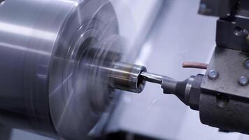 Metal lathe close-up. Lathe, metal processing, video