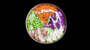 Top view of Poke Bowl rotating overlay isolaterd on black background video