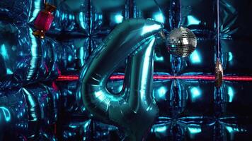 Party Background with Number 4 Foil Balloon, Disco Balls, and Lights video