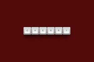 Cherry text on a 3d keyboard button with shadow concept series photo