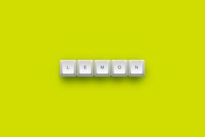 Lemon text on a 3d keyboard button with shadow concept series photo