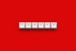 Tomato text on a 3d keyboard button with shadow concept series photo