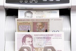 Belgian franc in the counting machine photo