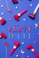 Concept of party decor and confetti, balloons and candles. photo