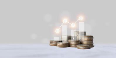 Stacks of coins and graphs financial concepts and financial investment business stock growth photo