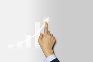 Businessman finger pointing arrow graph. Business development to success, profit and growing plan. photo
