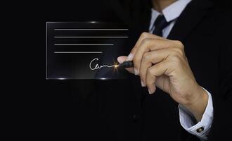 Electronic Signature Concept, Electronic Signing Businessman signs electronic documents on digital documents on virtual screen using stylus pen. photo