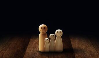 Wooden doll figures isolated on table. Insurance coverage concept photo