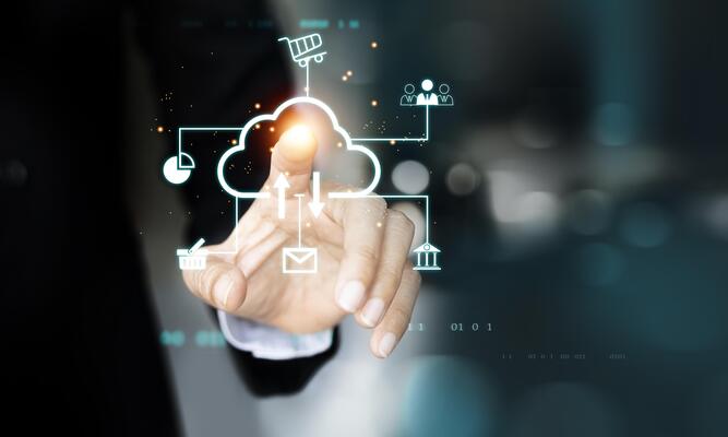 businessman hand pressing cloud computing icon on blurred background